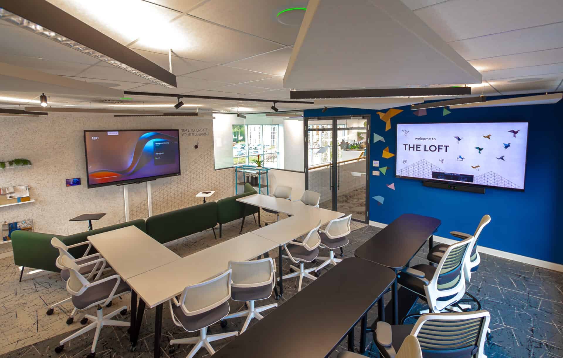 Modern corporate conference room with AV displays